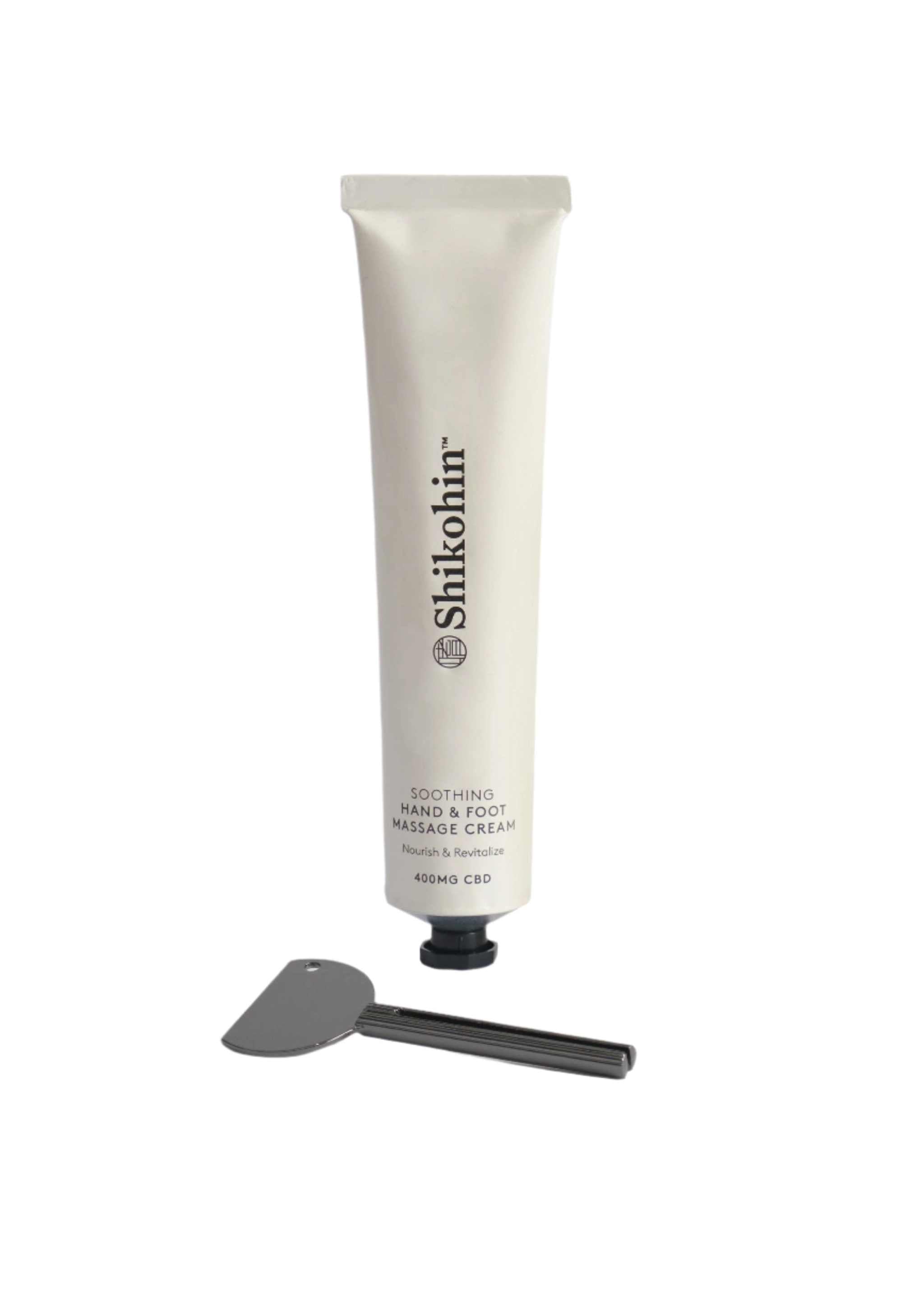 Shikohin Hand & Foot Massage Cream tube with spatula, enriched with snow mushroom and maritime pine bark.
