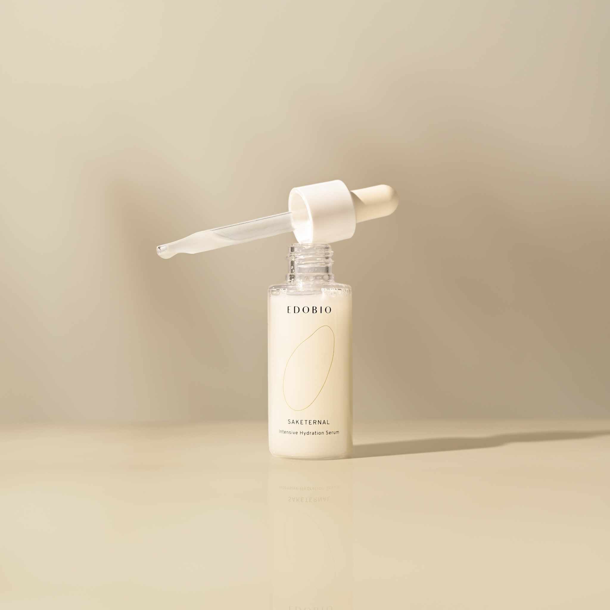 Edobio Intensive Hydration Serum bottle with dropper, natural skincare product for nourishing and toning face.