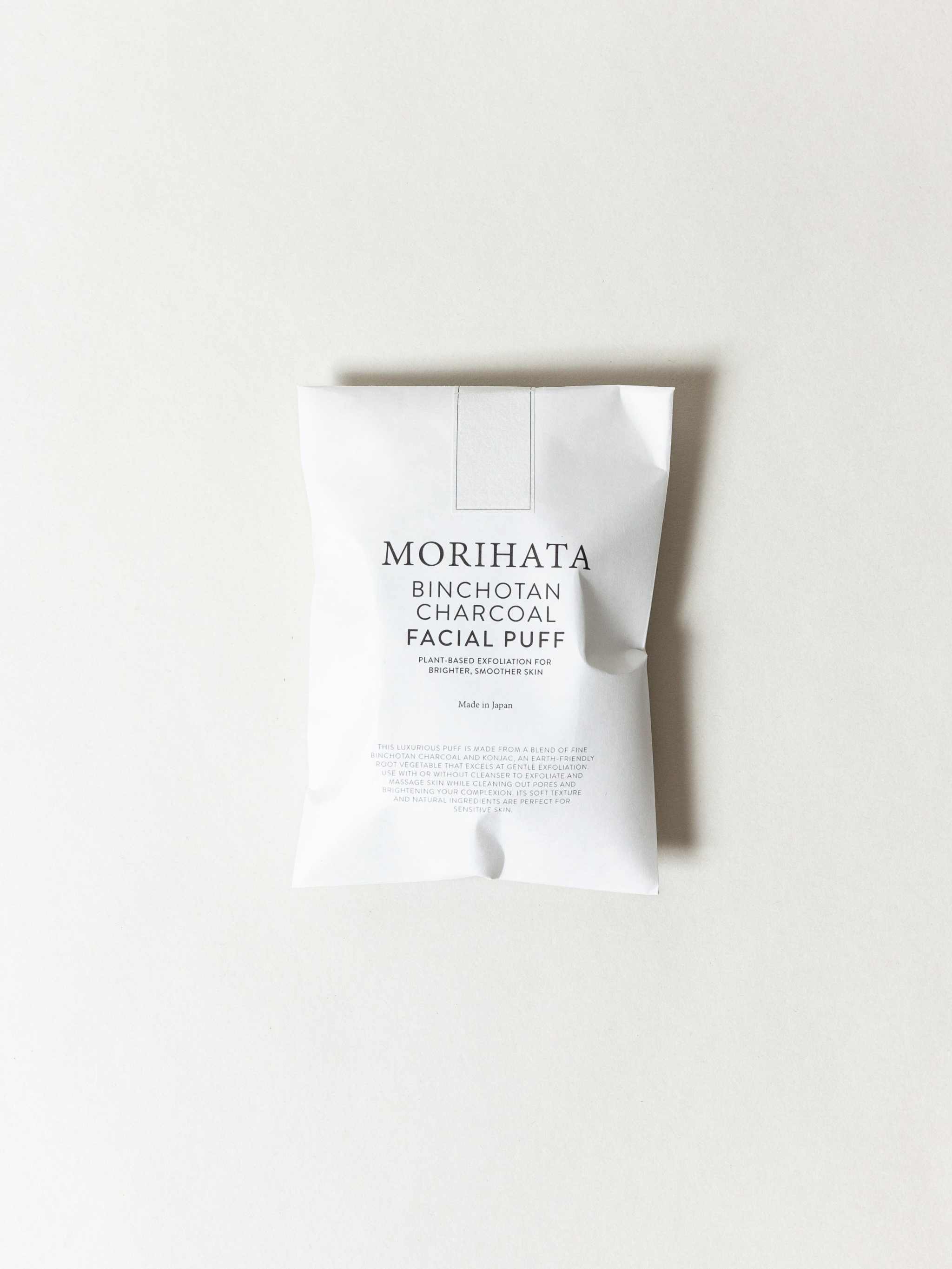 Binchotan Charcoal Facial Puff packaging on white background.
