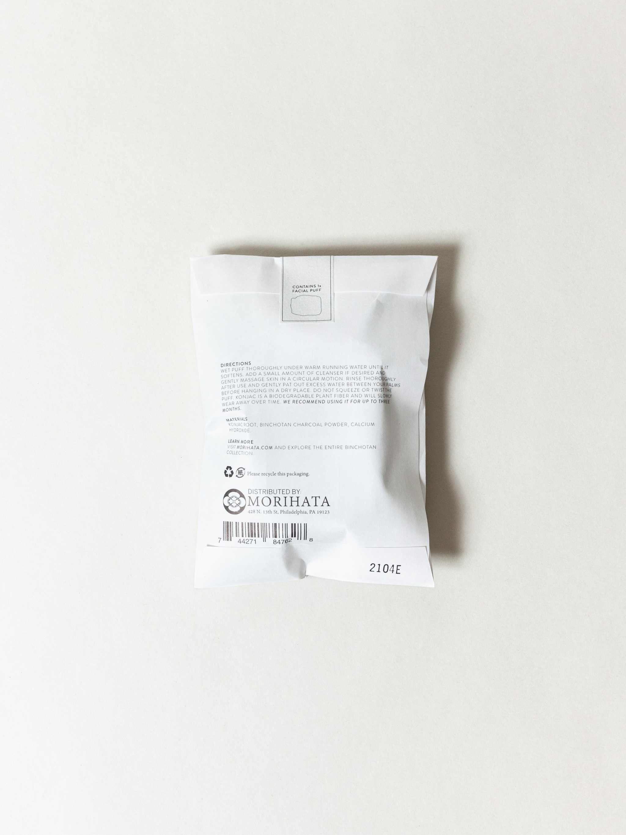 Binchotan Charcoal Facial Puff packaging against white background.