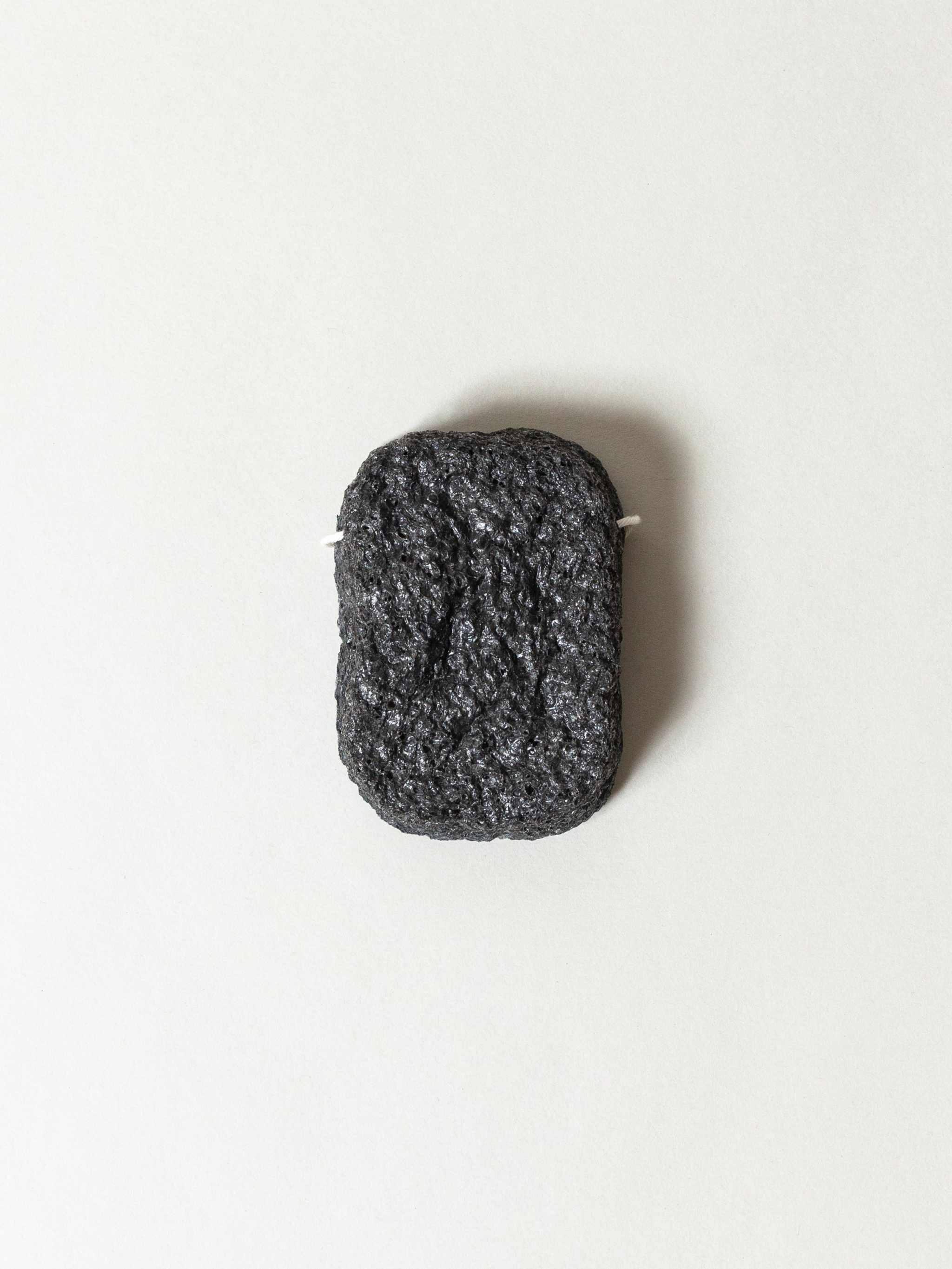 Binchotan Charcoal Facial Puff made from konjac root and charcoal, ideal for sensitive skin cleansing and exfoliation.