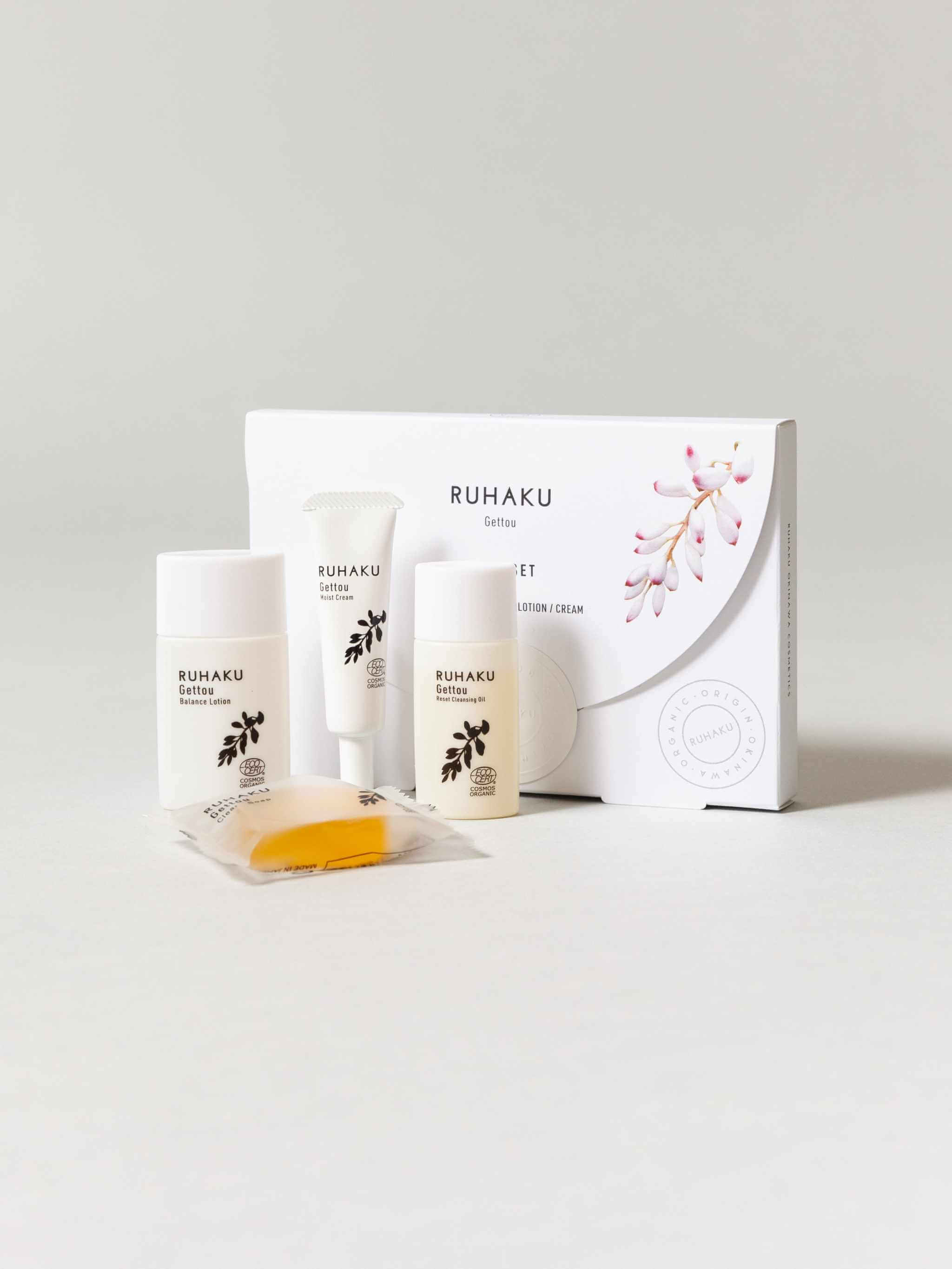 Travel size skincare set featuring organic Okinawan gettou and natural extracts.