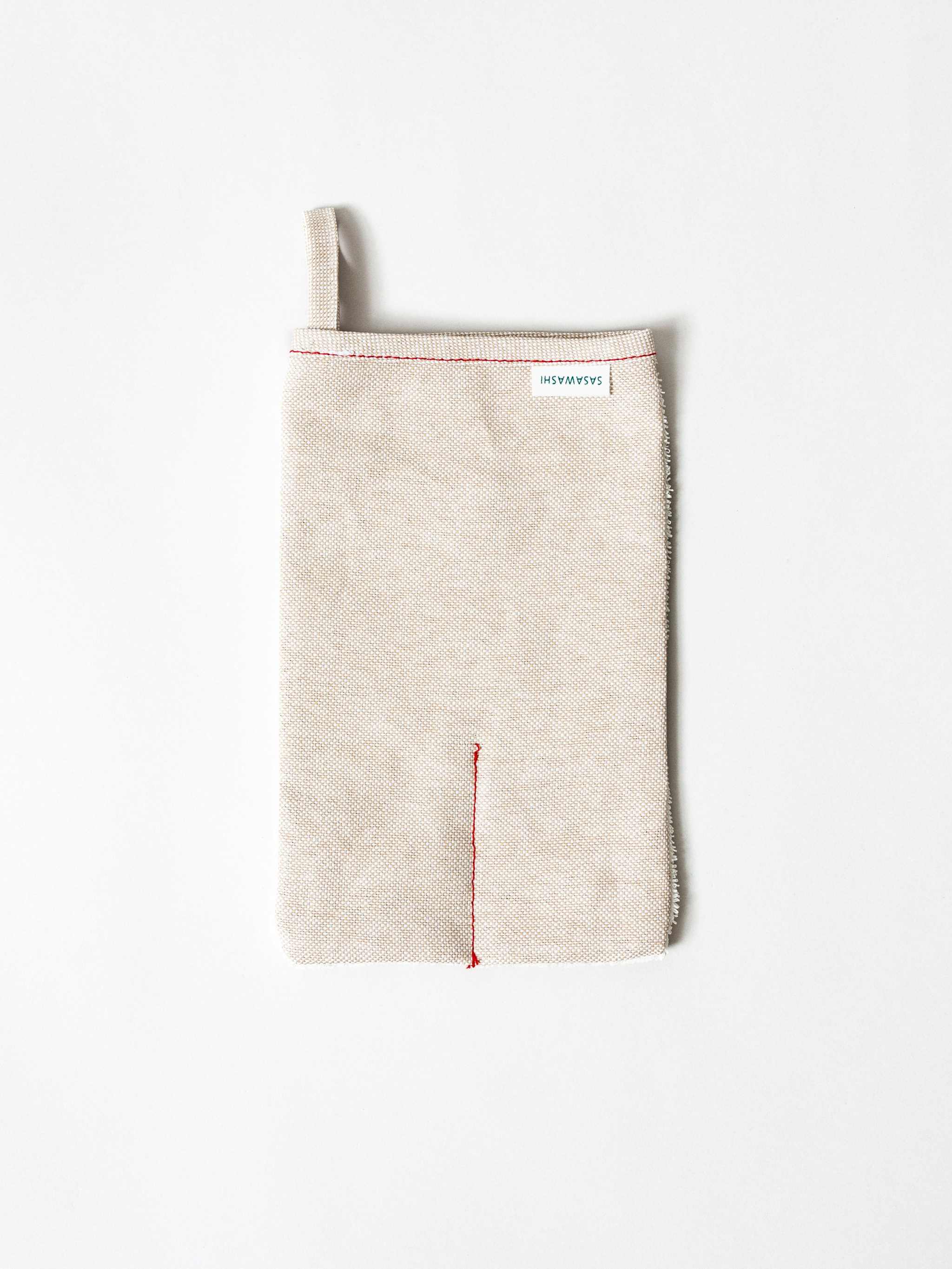 Sasawashi Deep Exfoliating Body Scrub Mitt for refreshing skin care routine.