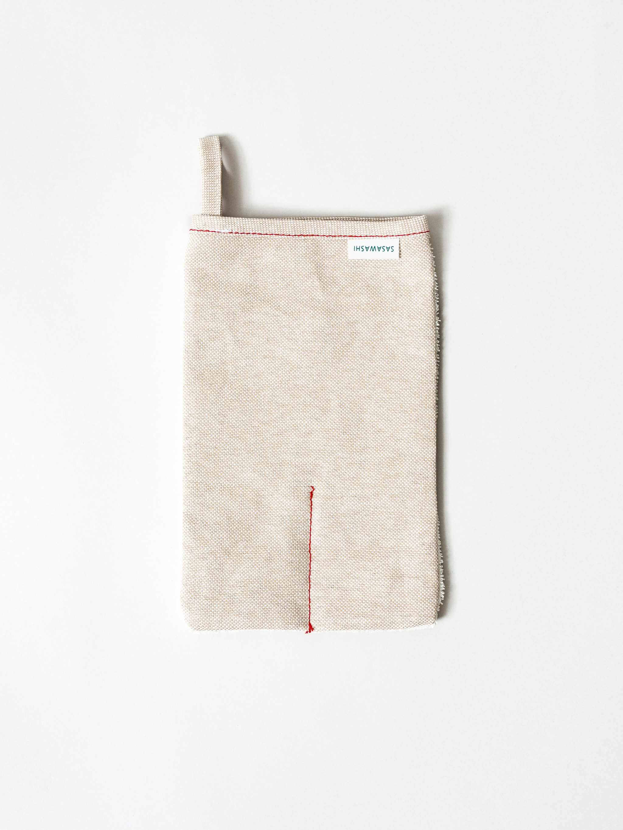 Sasawashi Deep Exfoliating Body Scrub Mitt for refreshing skin care routine.