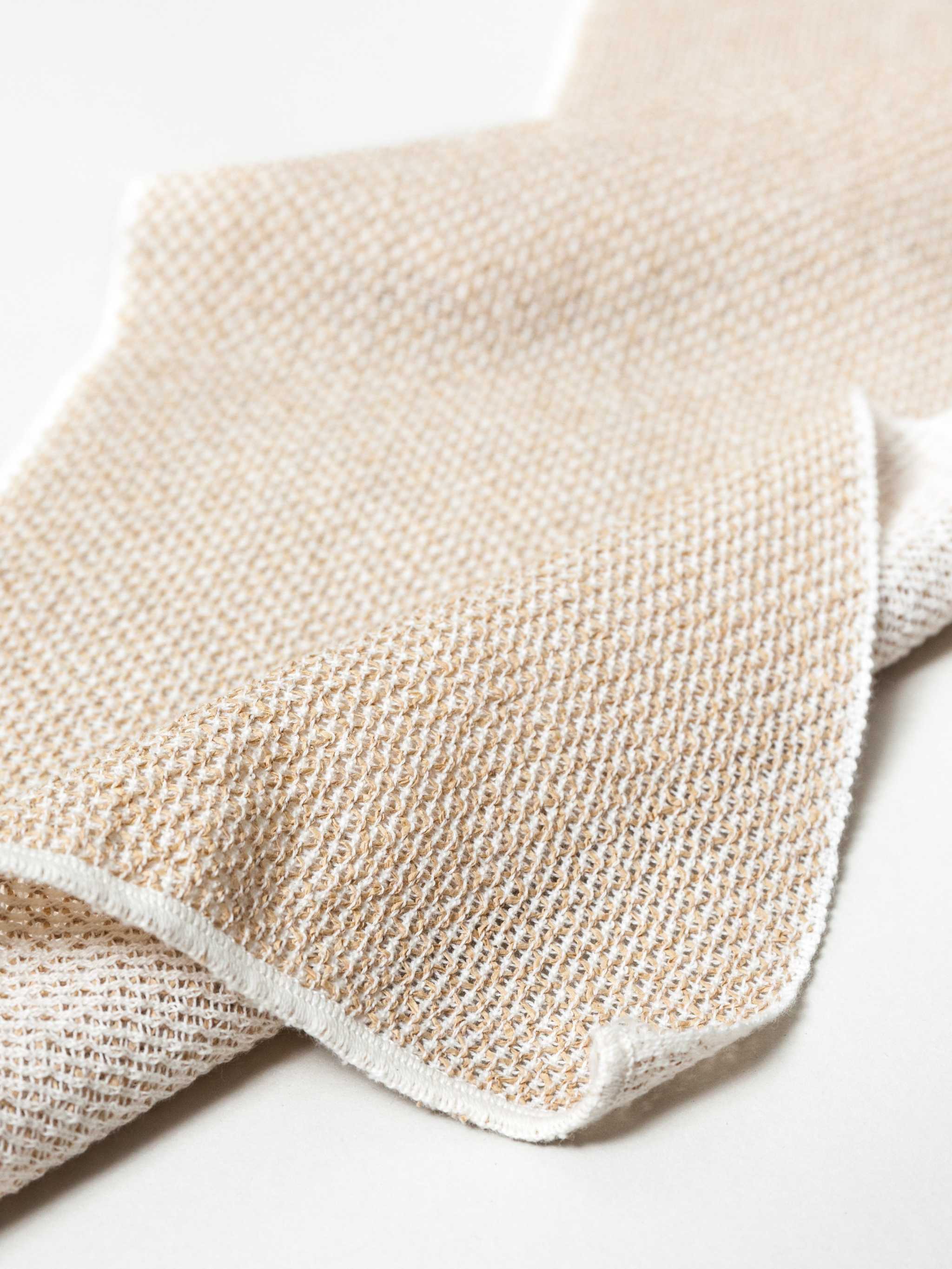 Sasawashi Mesh Body Scrub Towel made from exfoliating mesh fabric.