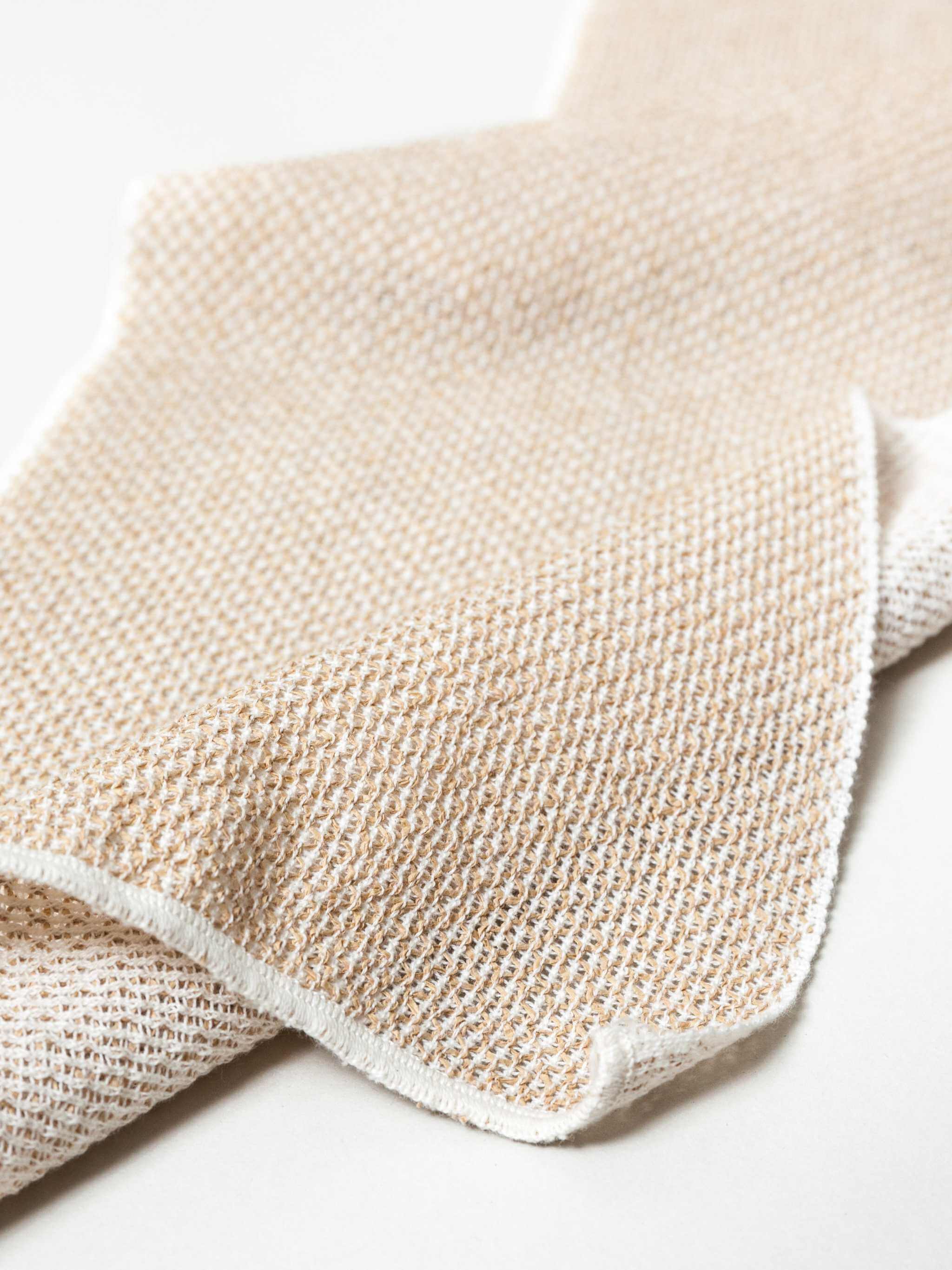 Sasawashi Mesh Body Scrub Towel made from exfoliating mesh fabric.