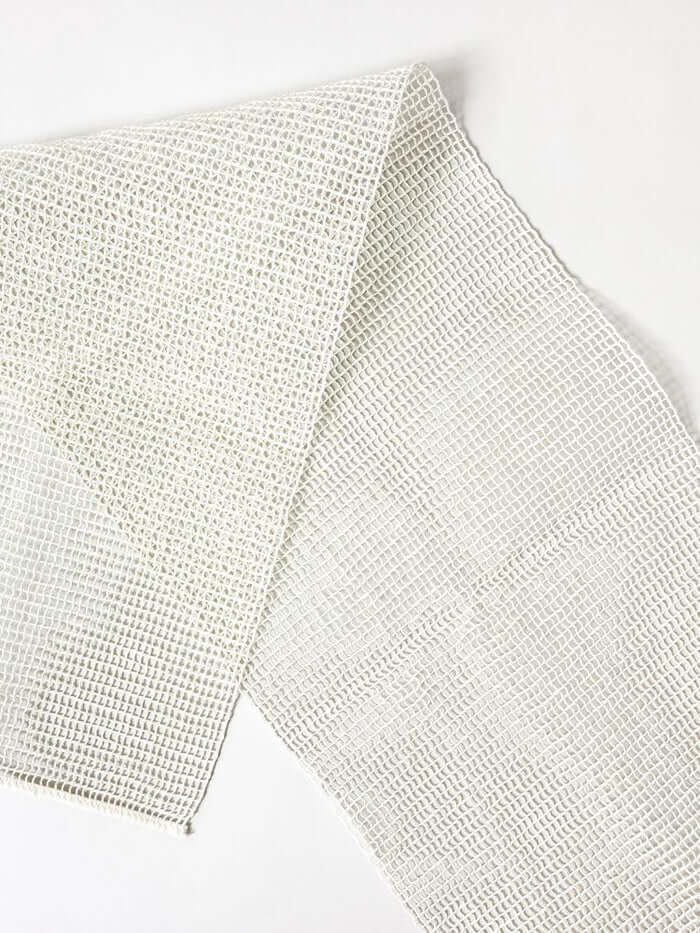 Close-up of a textured white fabric