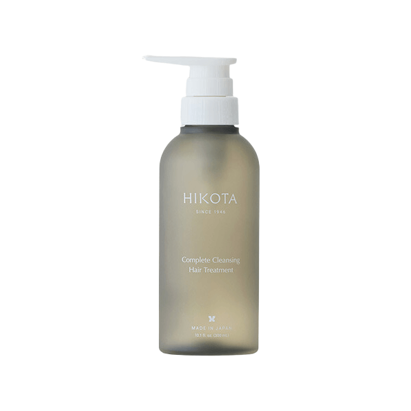 Hikota Complete Cleansing Hair Treatment bottle with pump dispenser.