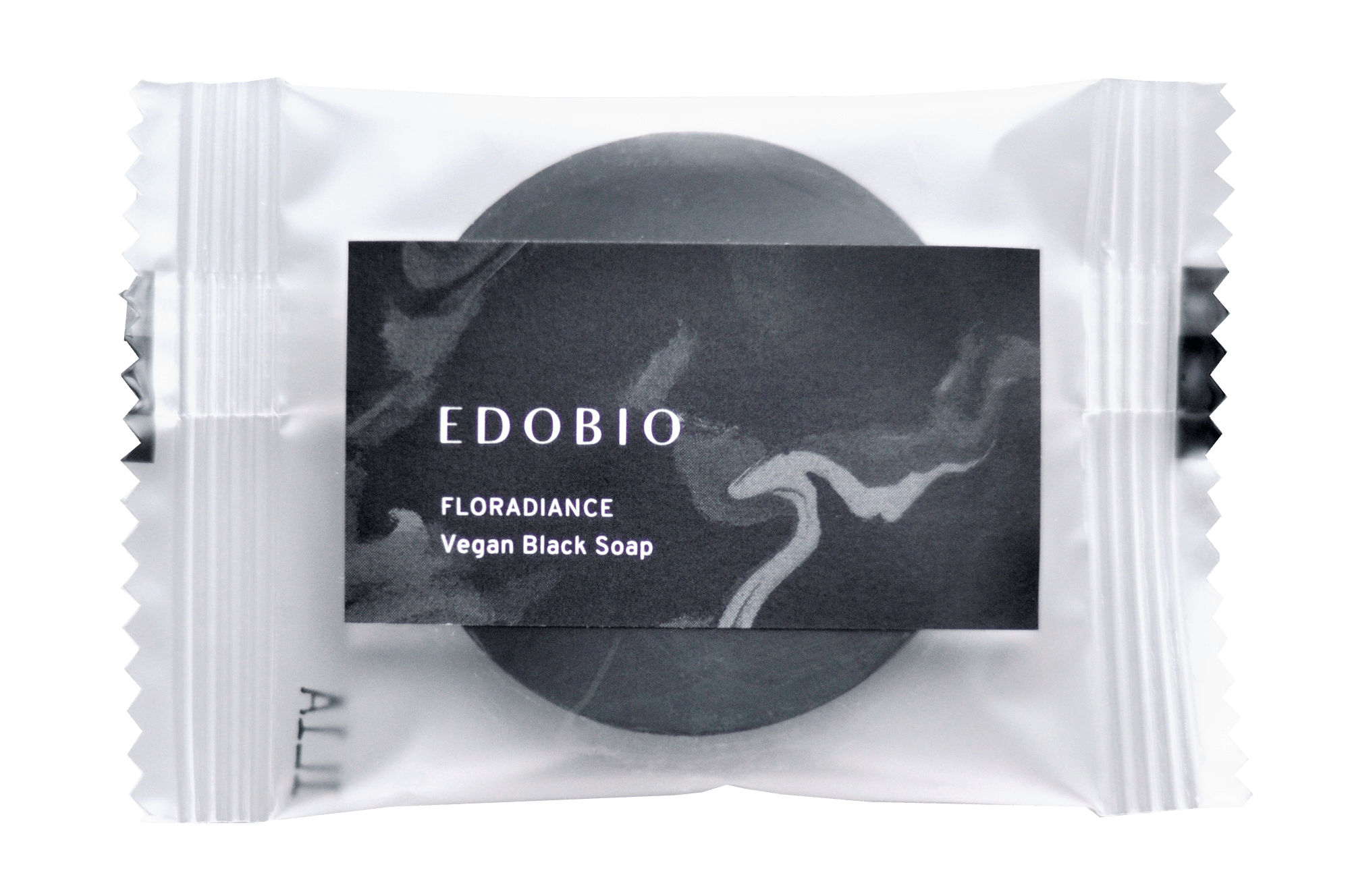 Mini Vegan Black Soap with charcoal and lactic acid, packaged for refill.
