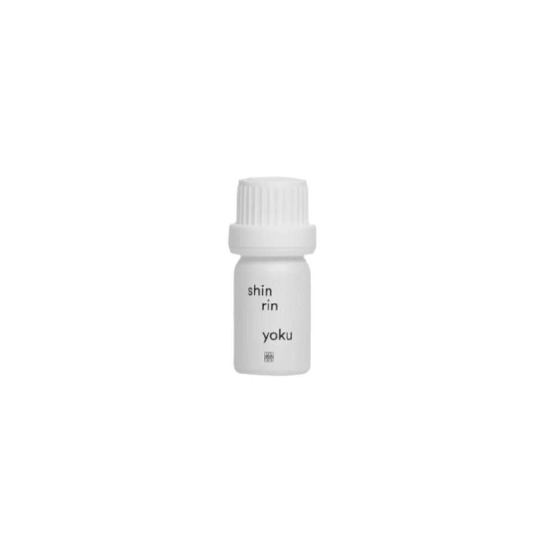 Shin Rin Yoku essential oil bottle, natural Hinoki trunk oil for morning rituals.