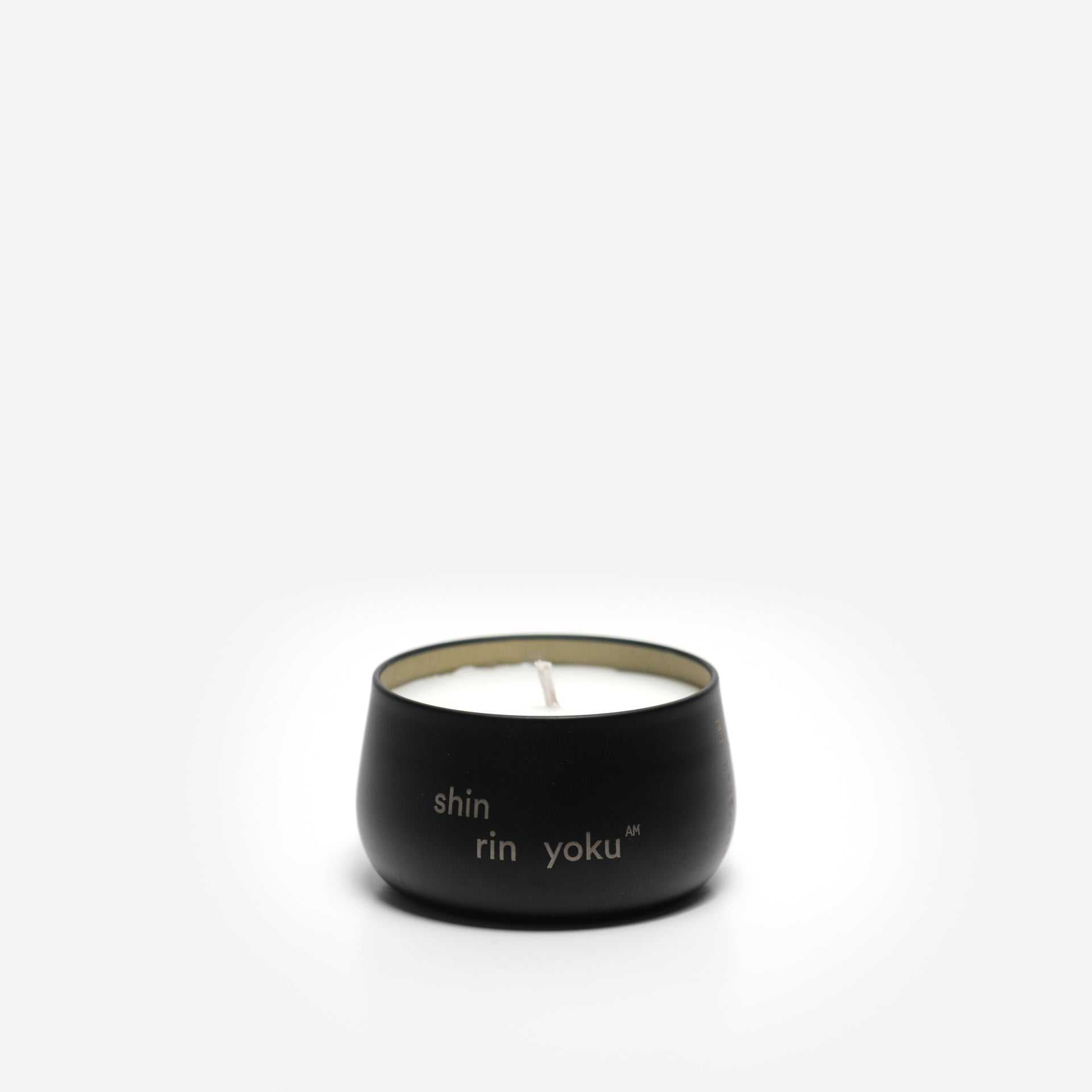 Hinoki Candle in black holder made with Hinoki trunk oil for morning rituals.