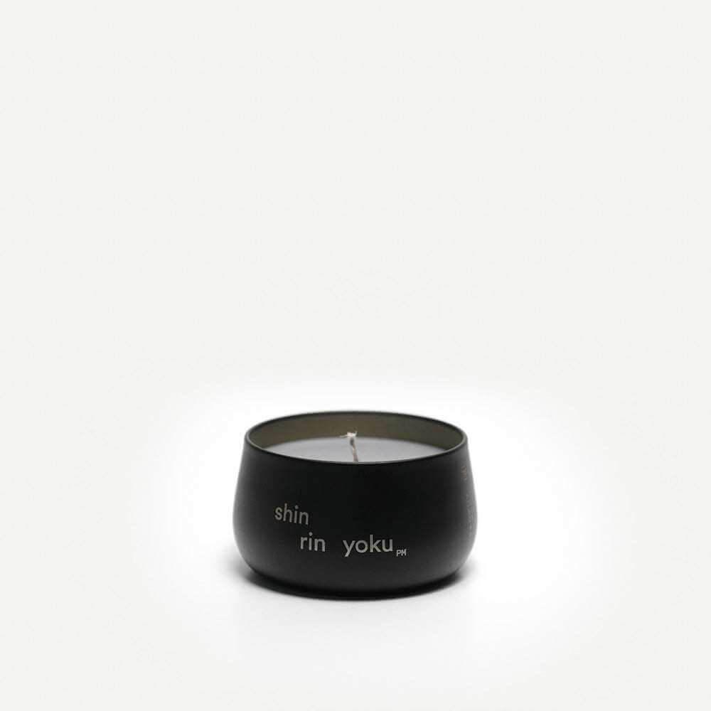 Hinoki Candle PM in black container for relaxation and meditation.
