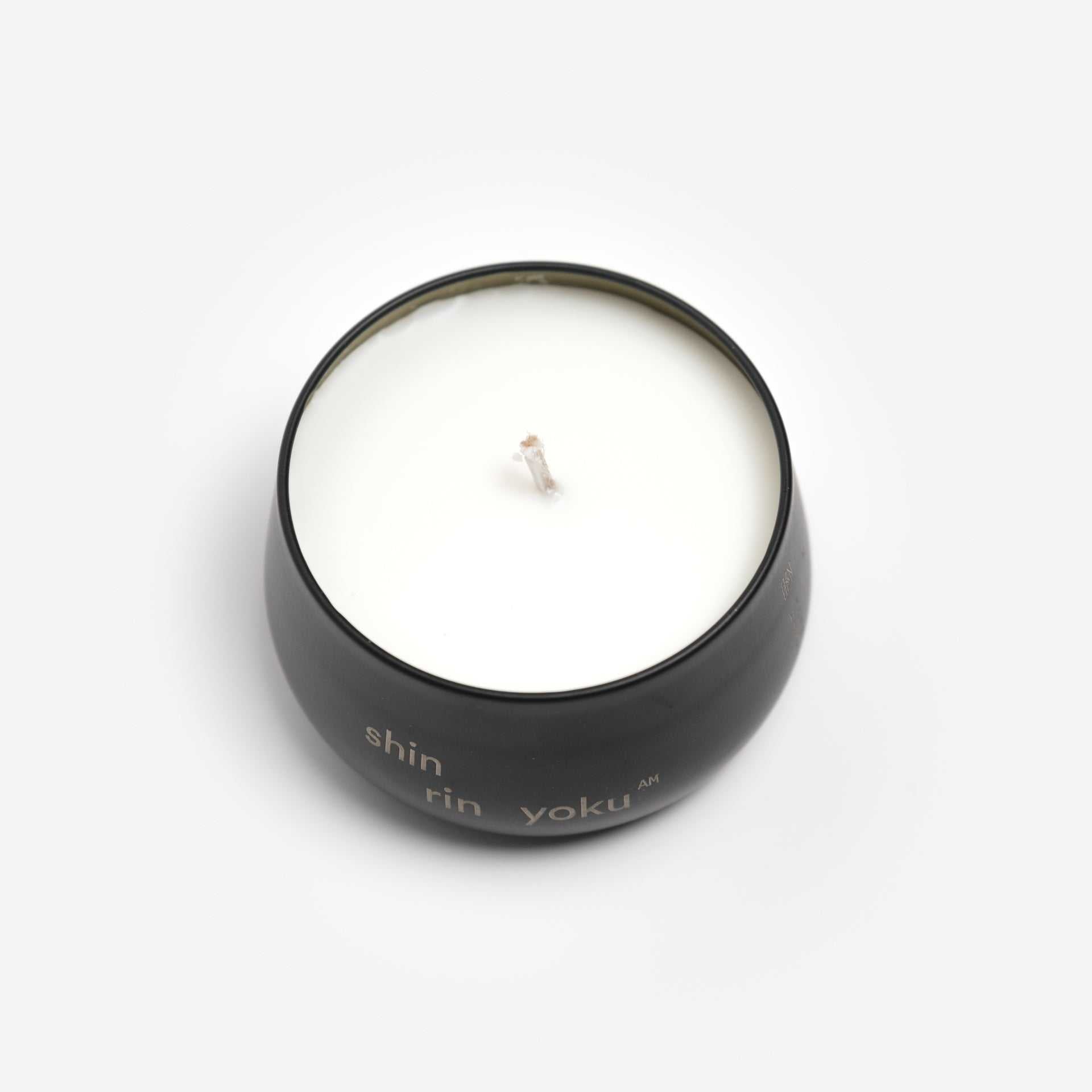 Hinoki Candle AM in black container, made with natural Hinoki trunk oil for morning rituals.